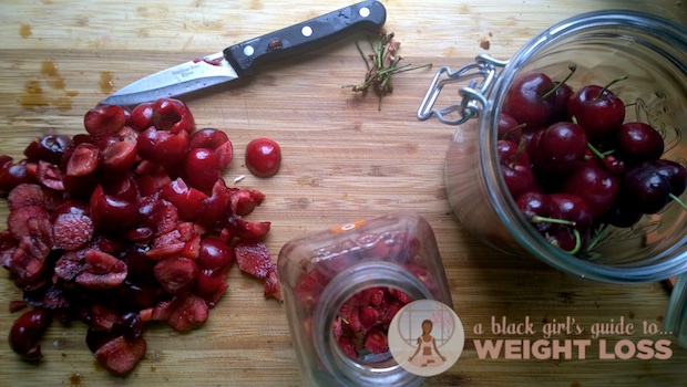 Photo demonstrating the cherries cut from the seeds and stems