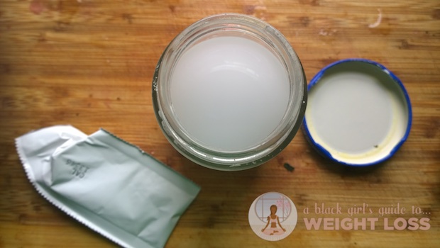 Pouring the powdered calcium inside an old glass jar